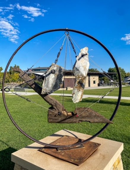 Courage at the Crossroads, a marble, steel and wood sail sculpture by Utah fine artist sculptor Byron Ramos, 2025
